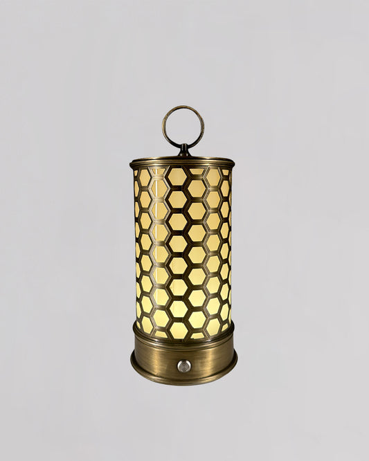 Decorative lantern with honeycomb pattern on a gray background
