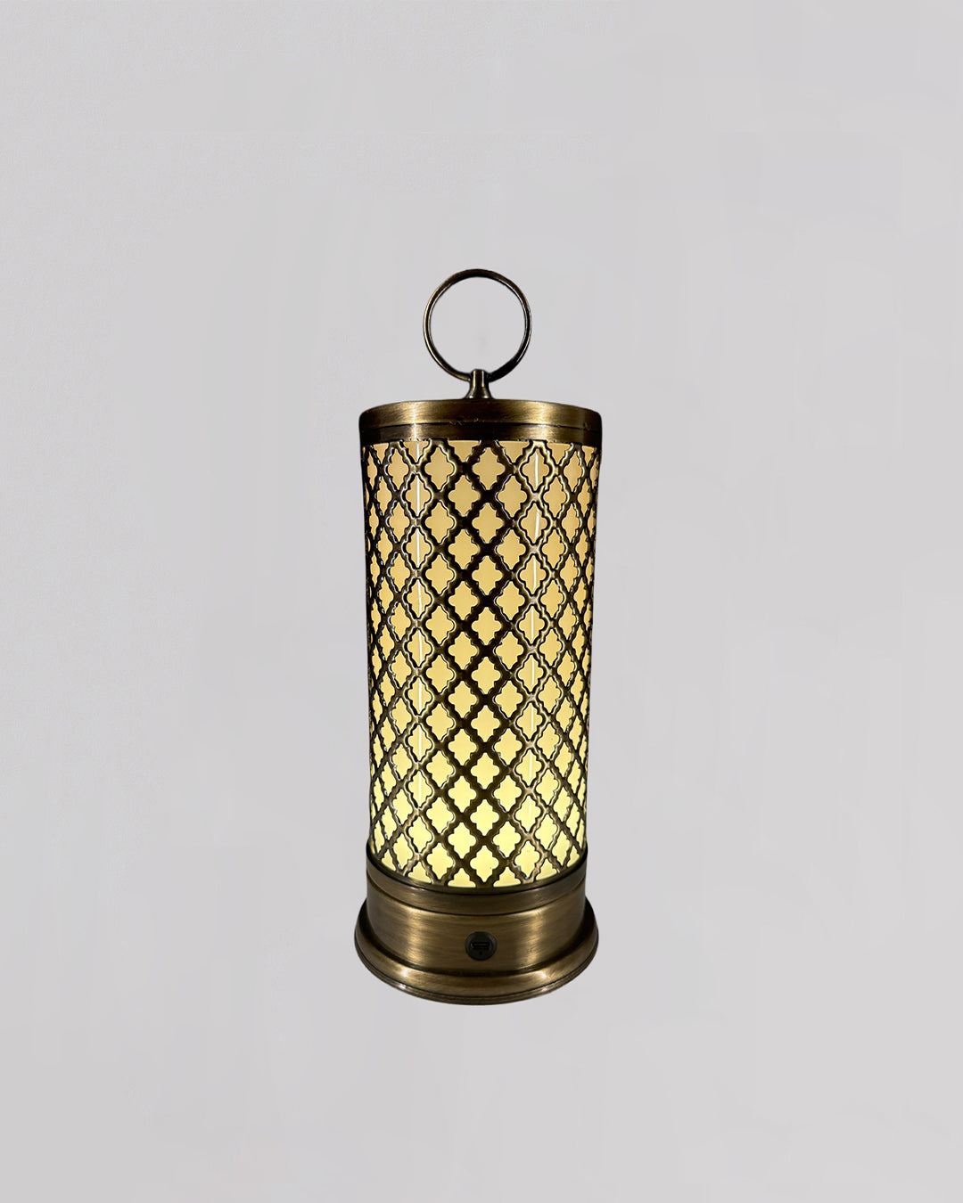 Decorative lantern with lattice design and glowing interior on a gray background
