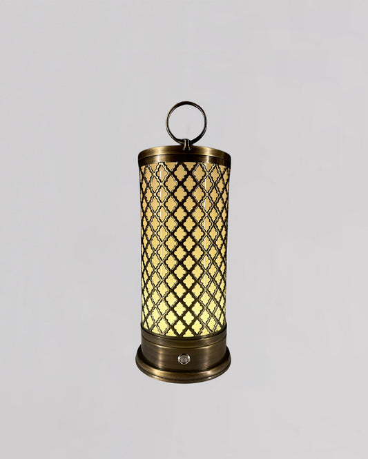 Decorative lantern with lattice design and glowing interior on a gray background