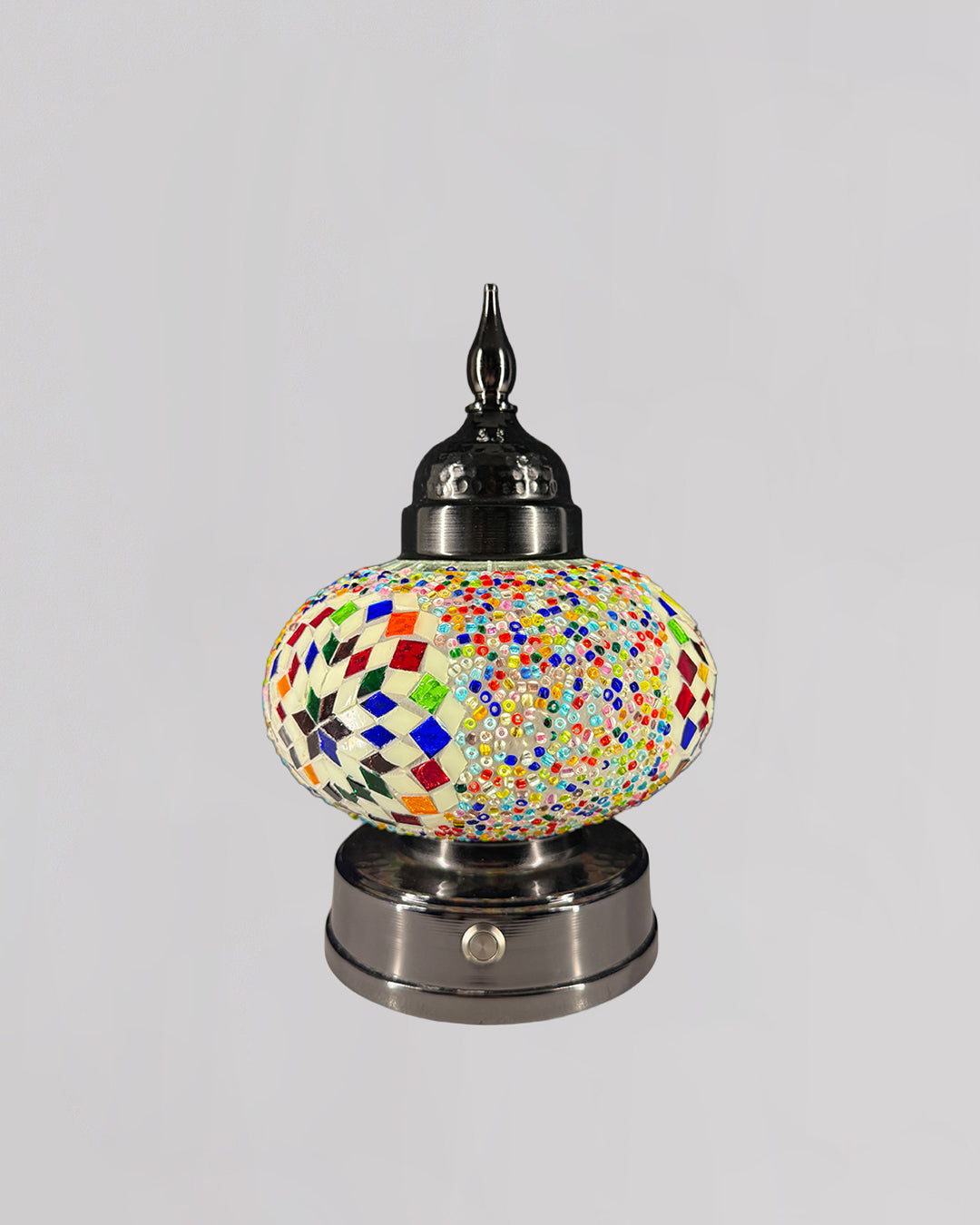 Decorative lamp with colorful mosaic design on a gray background