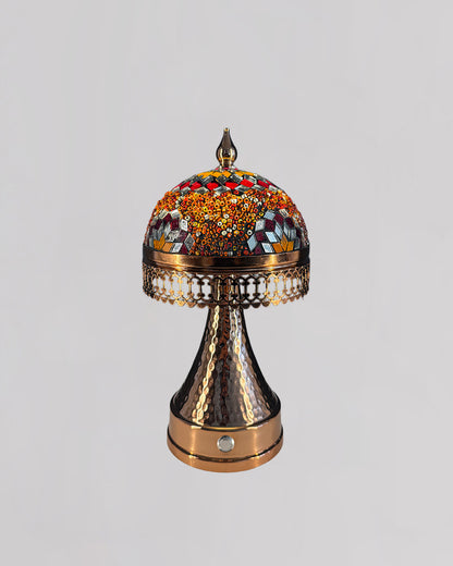Decorative lamp with intricate design on a light gray background