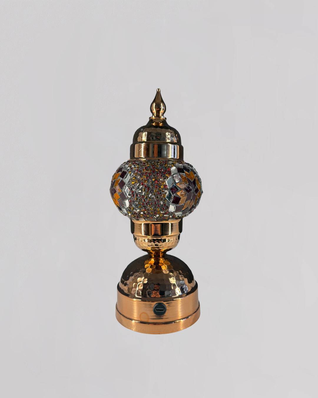 Decorative lamp with crystal ball on a gray background